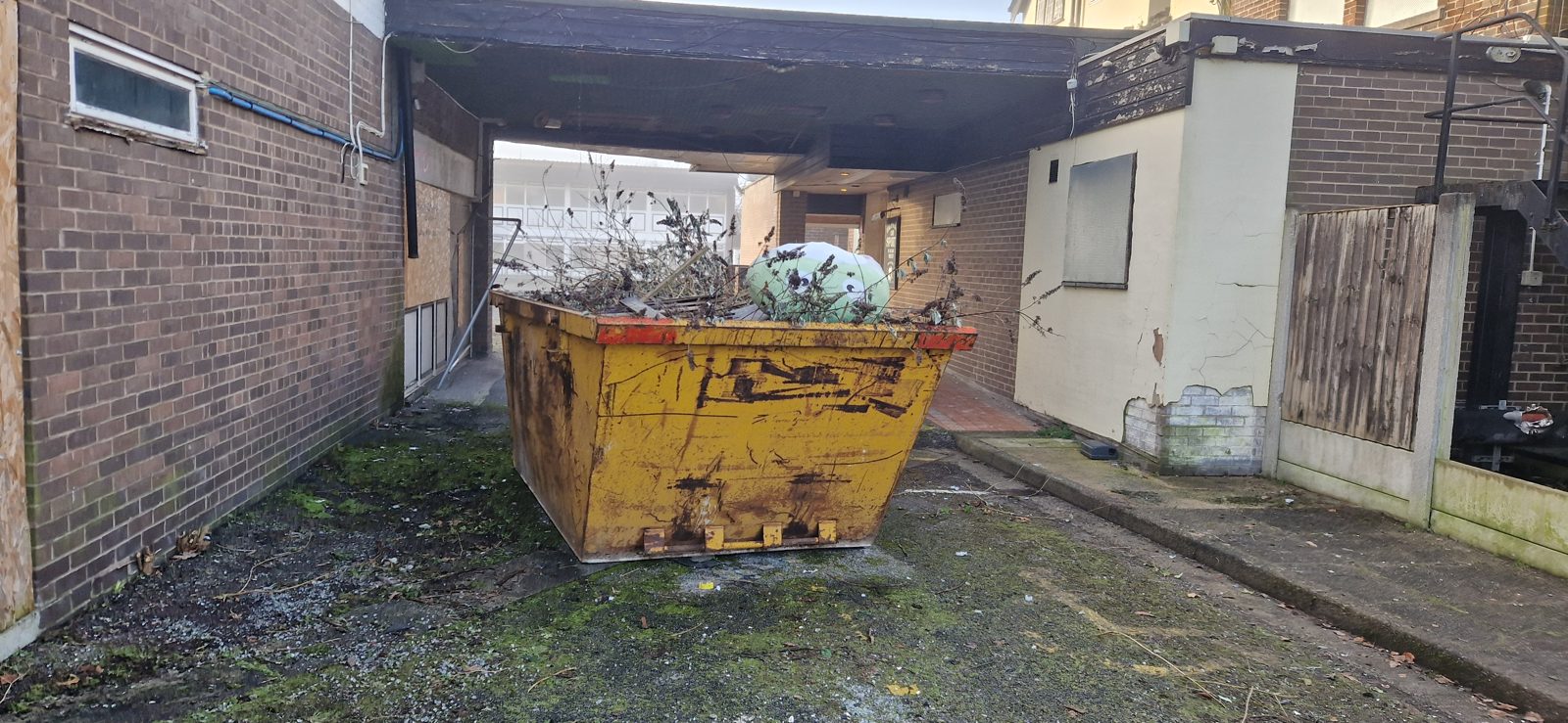 Skip at a business site, a common target for fly-tipping